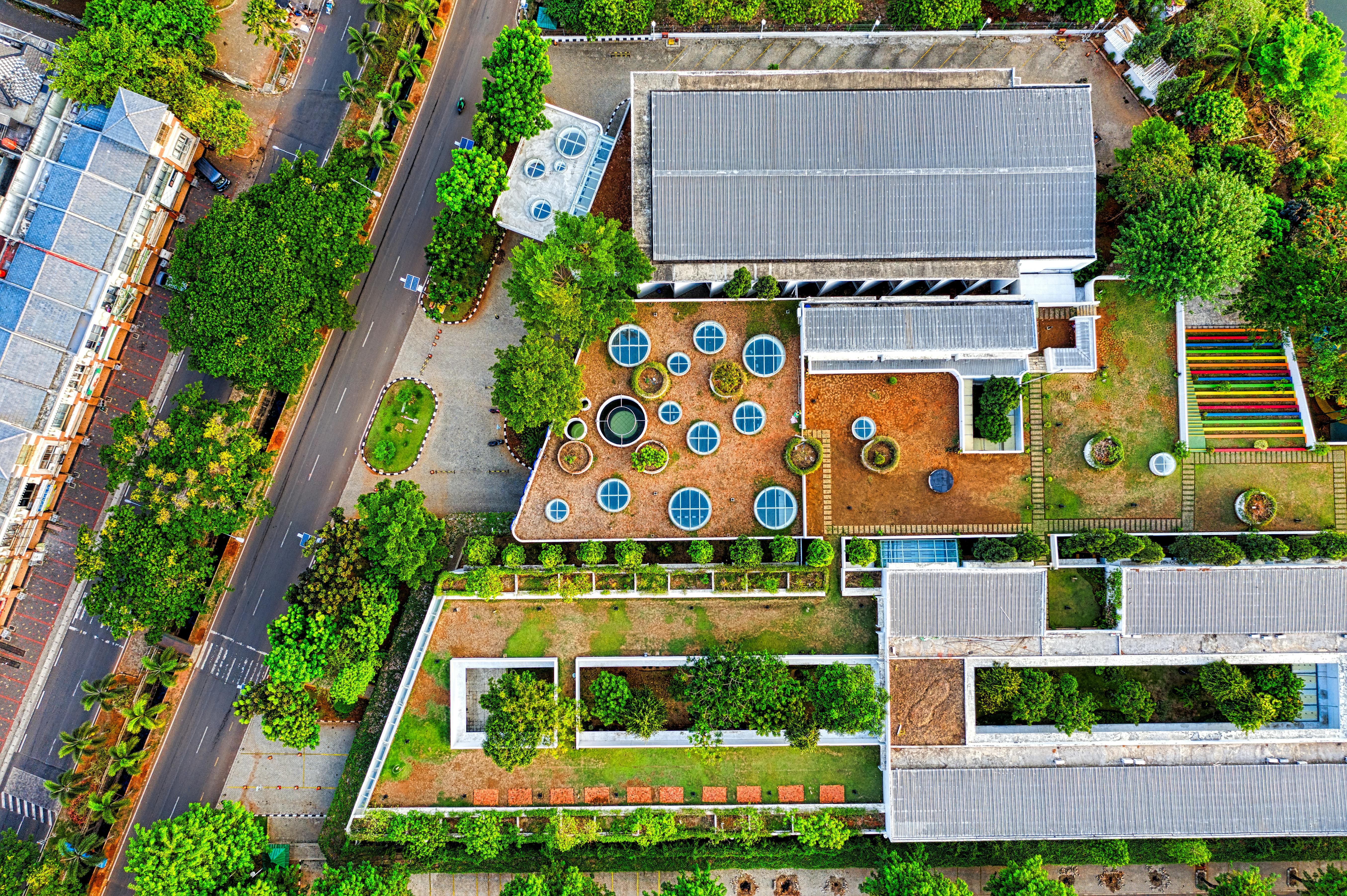 Aerial view of buildings surrounded by trees